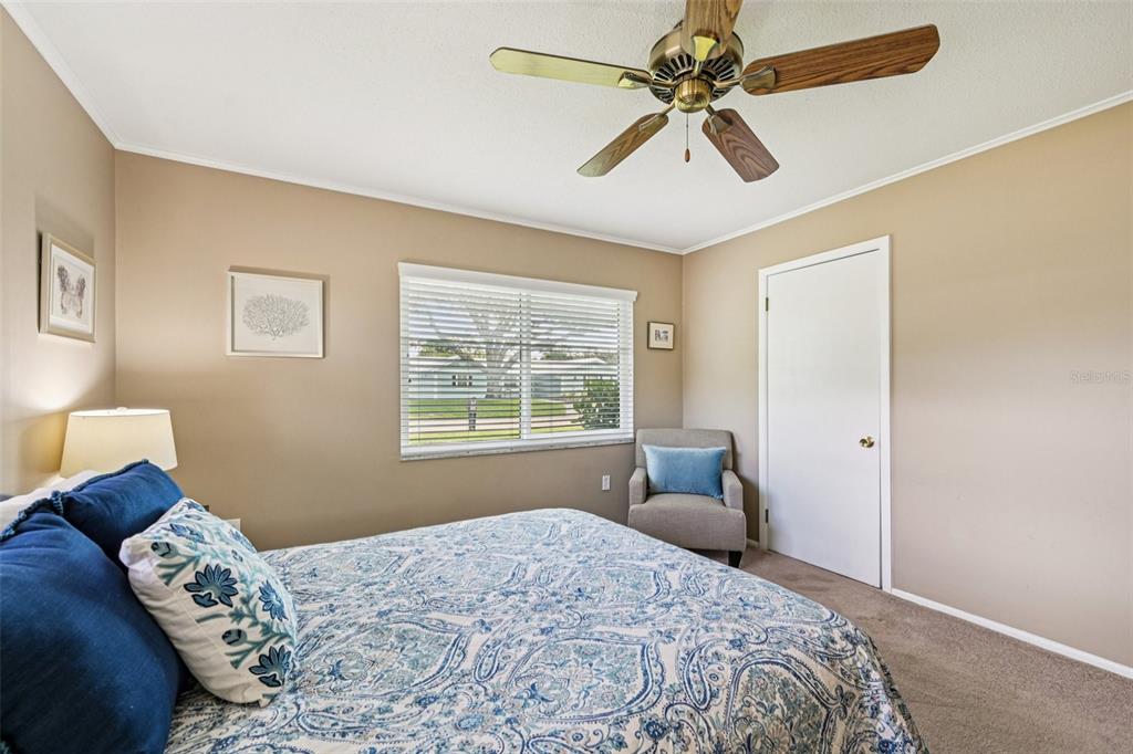 1908 49th Street West Bradenton, FL 34209 - Photo 23 of 57 a bedroom with a bed and a window