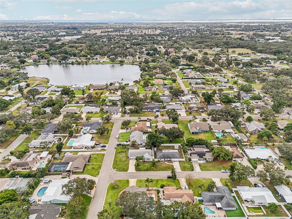 1908 49th Street West Bradenton, FL 34209 - Photo 55 of 57 an aerial view of residential building and lake
