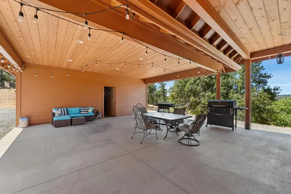 an aerial view of residential house and outdoor space