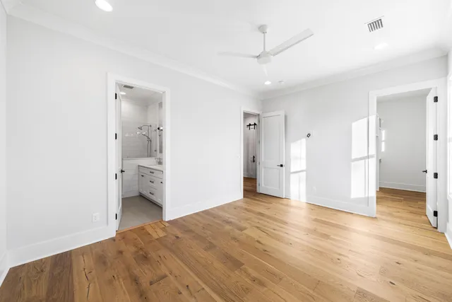 a view of a bedroom and a bathroom