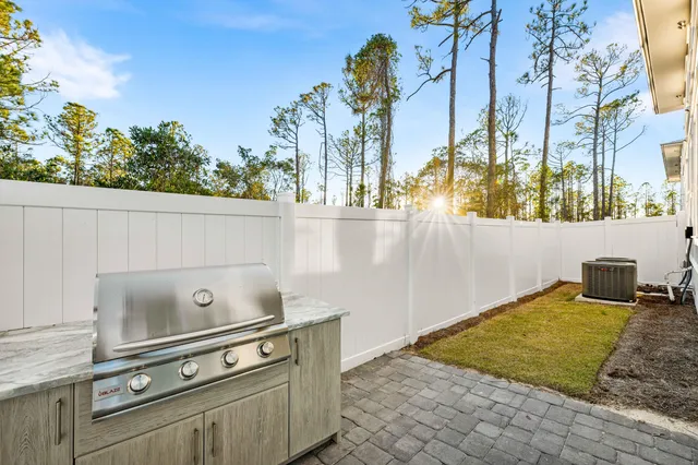 a view of a room with wooden floor and balcony