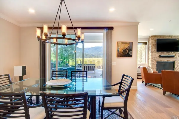 a view of a dining room with furniture window and outside view