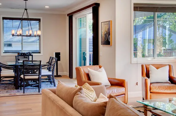 a outdoor living room with furniture and a window
