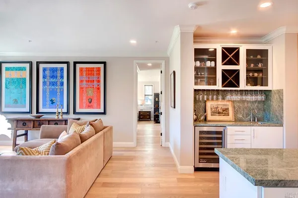 a living room with furniture and windows
