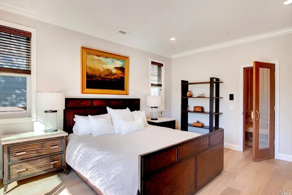 a bedroom with furniture and window