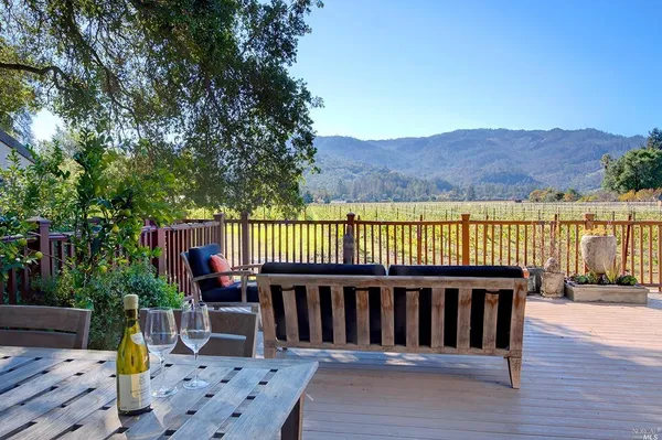 a view of a wooden chairs and table on the wooden floor