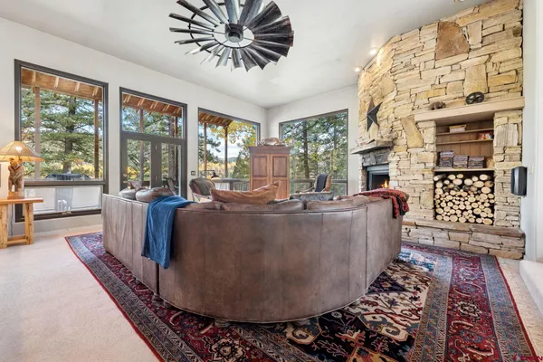 a living room with large windows