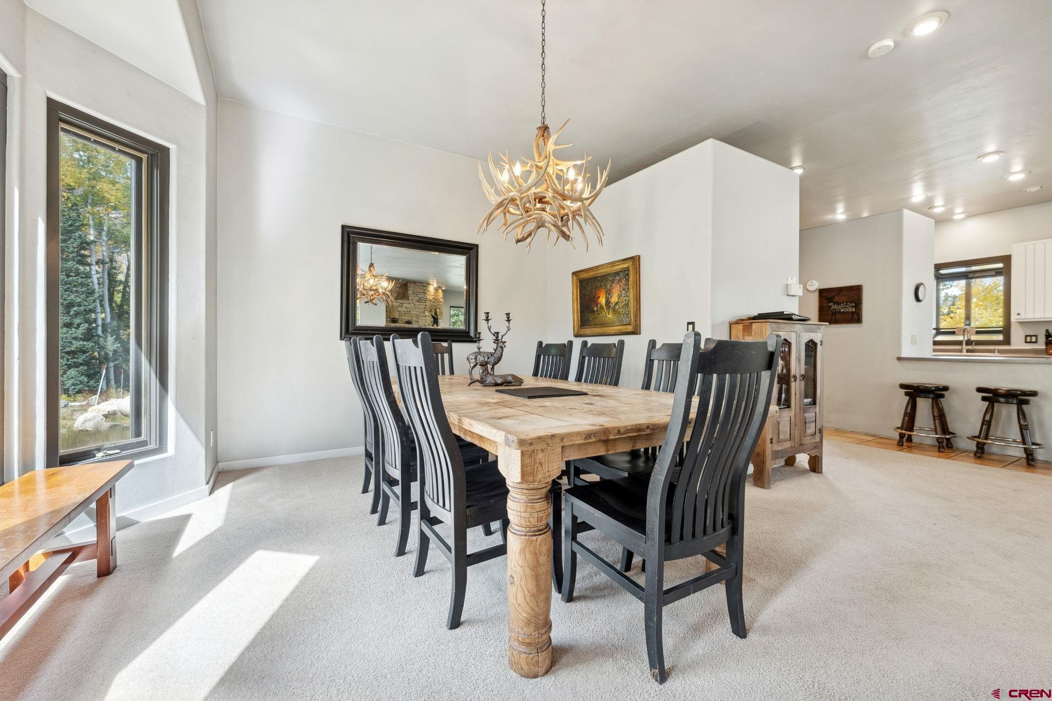 333 Beaver Circle Durango, CO 81301 - Photo 15 of 45 a view of a a dining room with furniture window and outside view