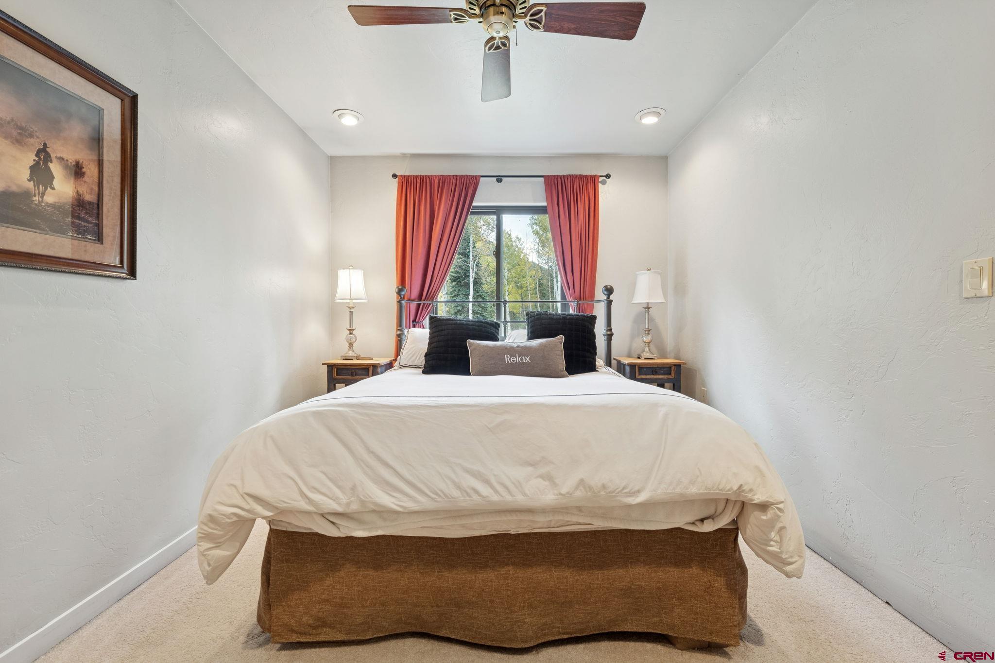 333 Beaver Circle Durango, CO 81301 - Photo 31 of 45 a bedroom with a bed and window