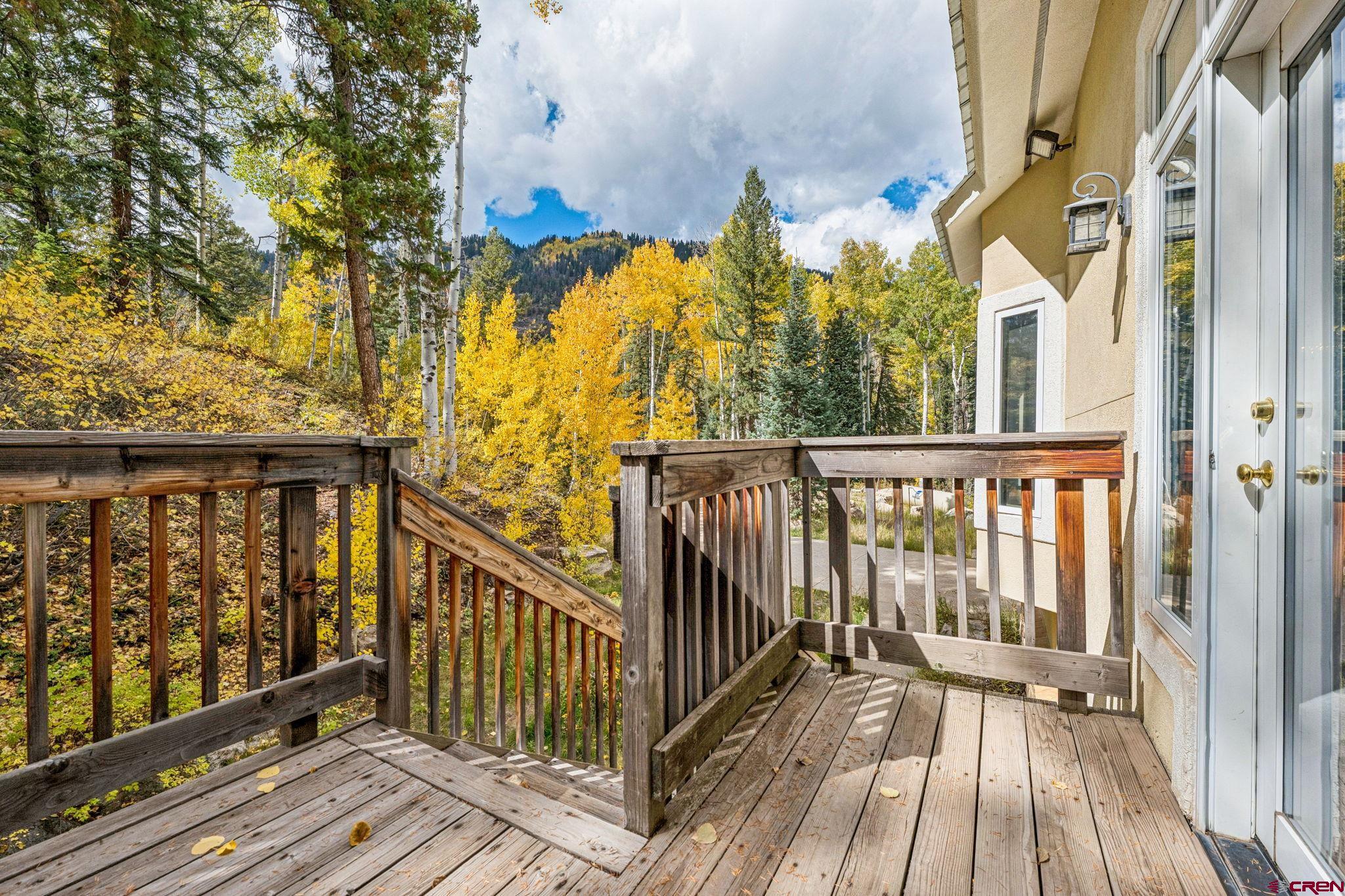 333 Beaver Circle Durango, CO 81301 - Photo 34 of 45 a view of a balcony with wooden floor and fence