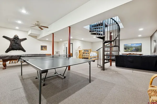 workspace with furniture and staircase