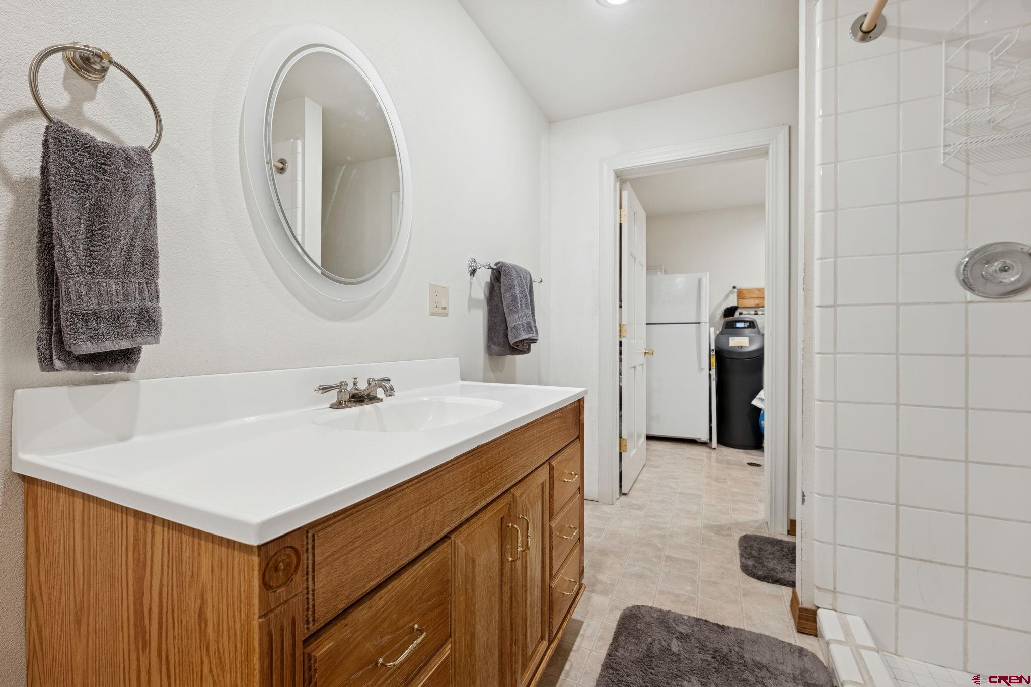 333 Beaver Circle Durango, CO 81301 - Photo 39 of 45 a bathroom with a sink and a mirror
