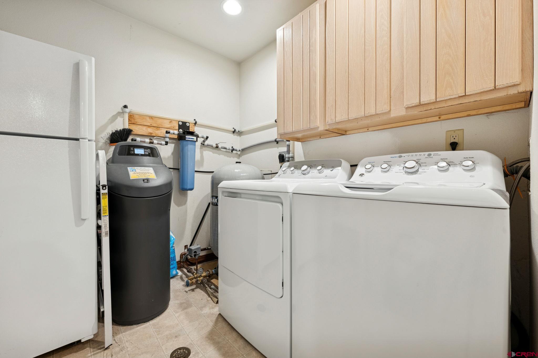 333 Beaver Circle Durango, CO 81301 - Photo 41 of 45 a utility room with dryer and washer