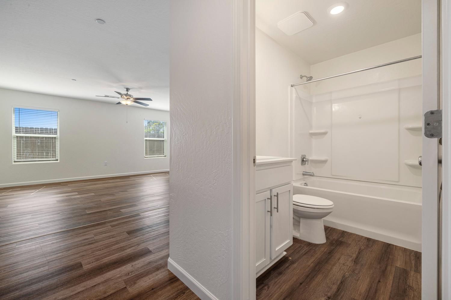 342 Rubicon Court Merced, CA 95341 - Photo 20 of 40 a bathroom with a toilet and a shower