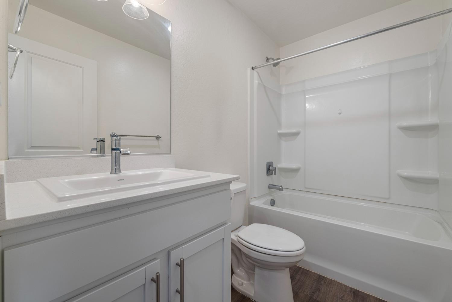 342 Rubicon Court Merced, CA 95341 - Photo 21 of 40 a bathroom with a sink toilet and shower