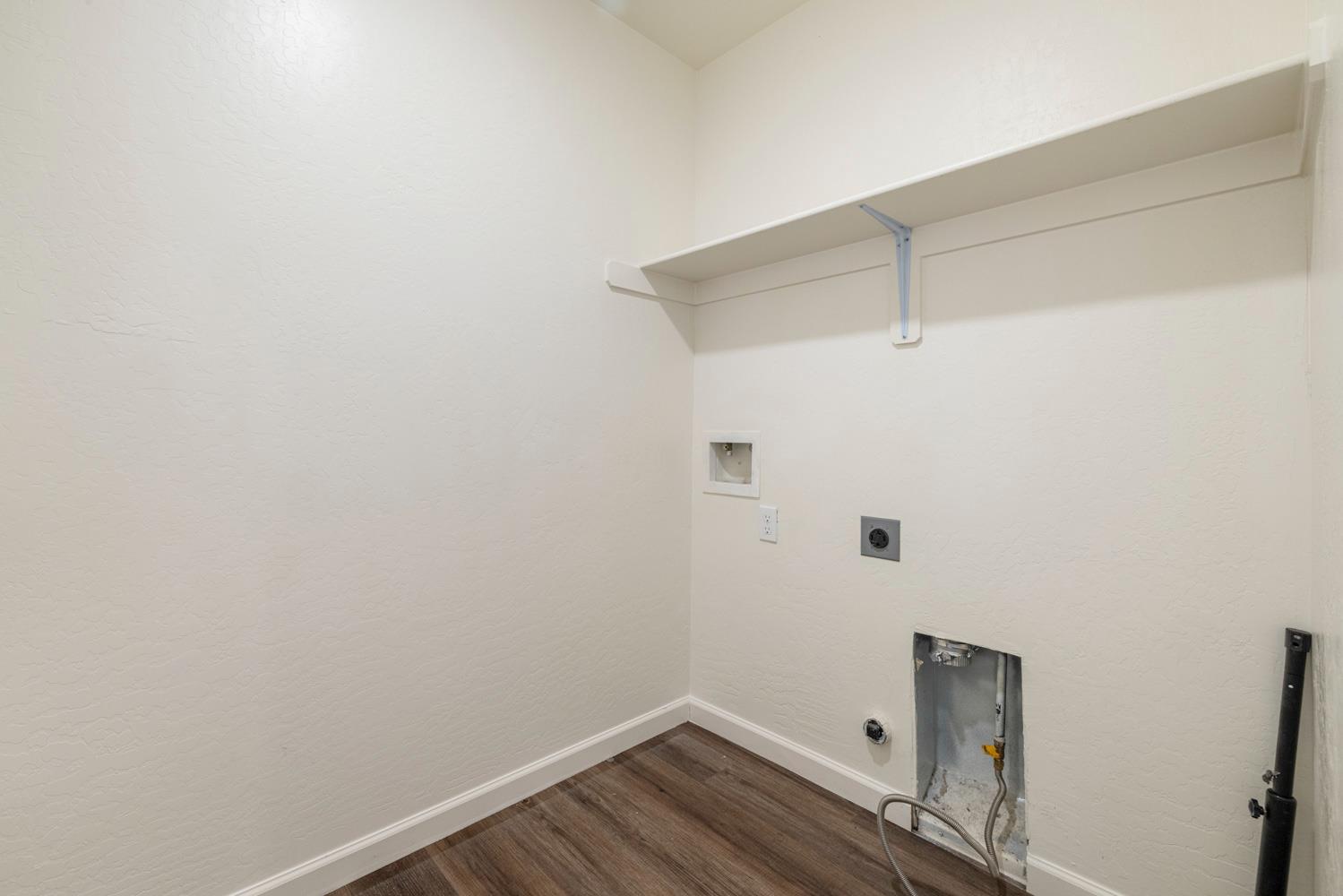 342 Rubicon Court Merced, CA 95341 - Photo 24 of 40 a view of a room with wooden floor