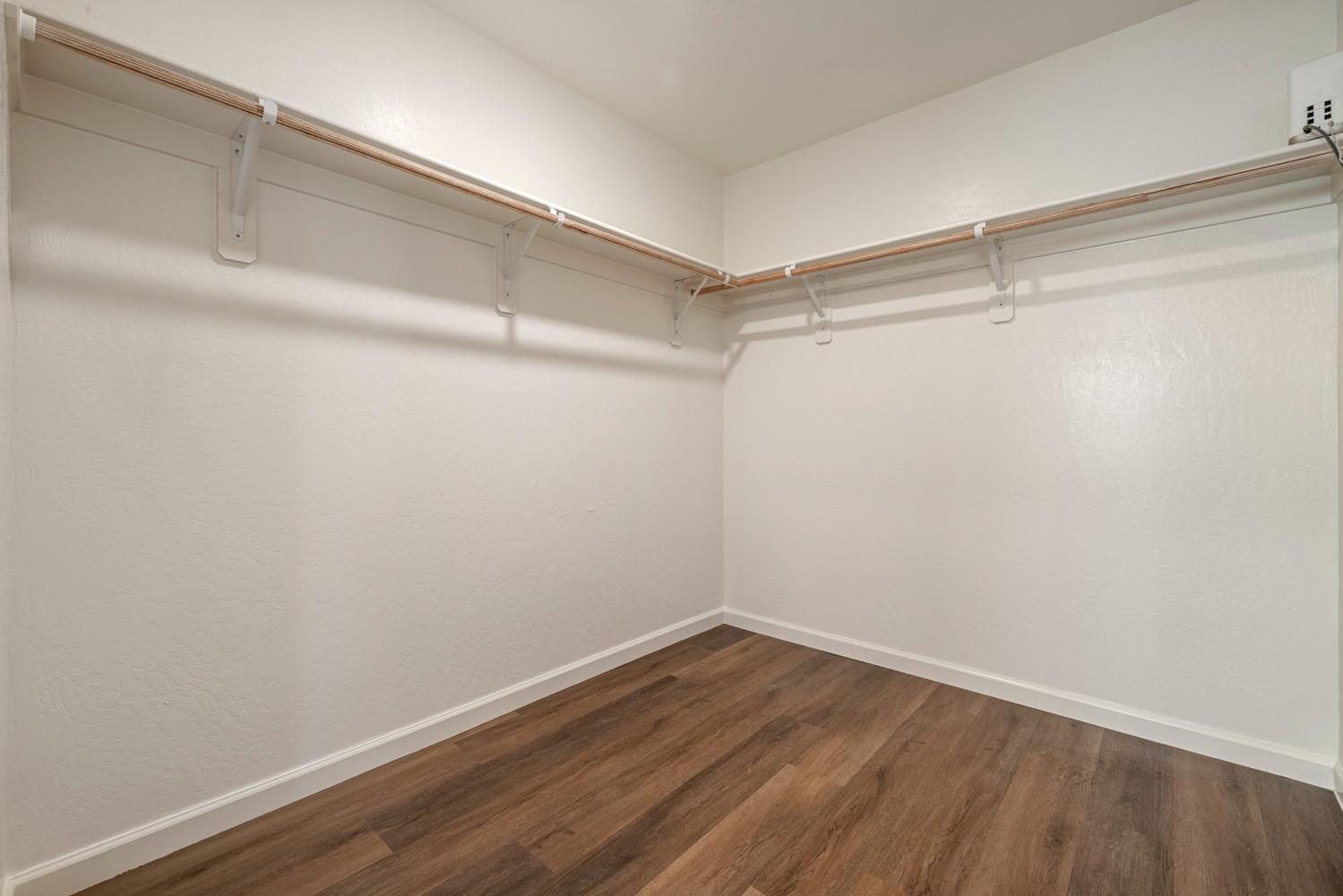342 Rubicon Court Merced, CA 95341 - Photo 36 of 40 a view of a room with wooden floor