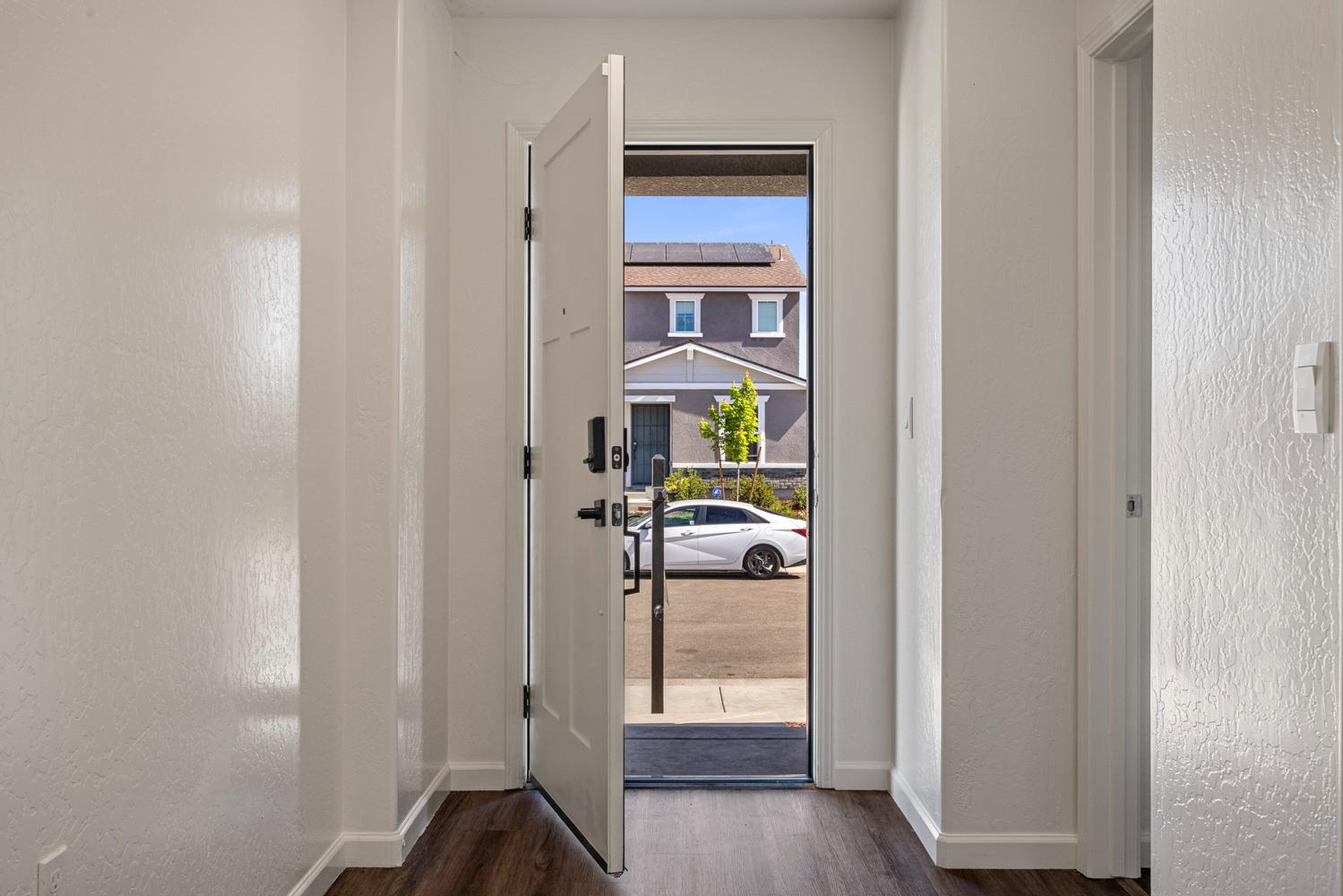342 Rubicon Court Merced, CA 95341 - Photo 5 of 40 a view of front door with wooden floor