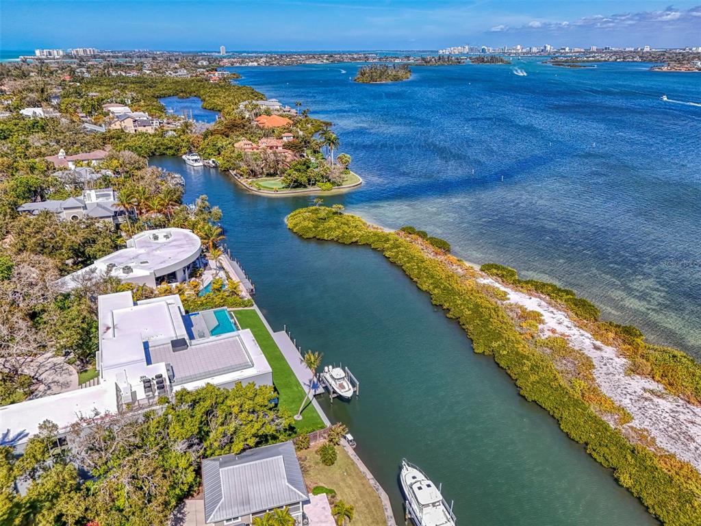 5303 Hidden Harbor Road Sarasota, FL 34242 - Photo 64 of 72 an aerial view of house with yard swimming pool and ocean view