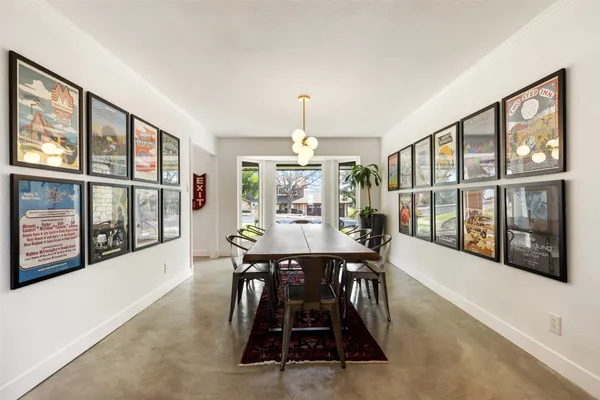 a view of a kitchen center island and windows