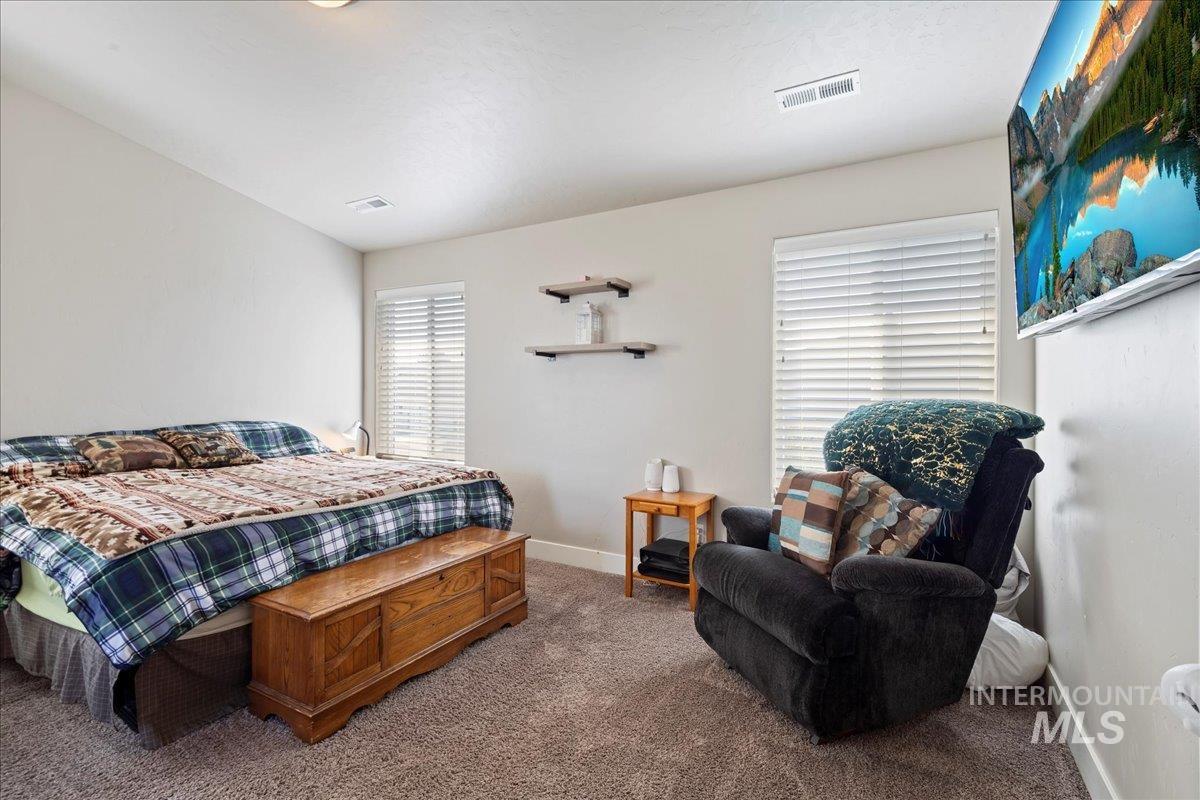 6091 East Path Drive Nampa, ID 83687 - Photo 17 of 33 Bedroom featuring carpet flooring and baseboards
