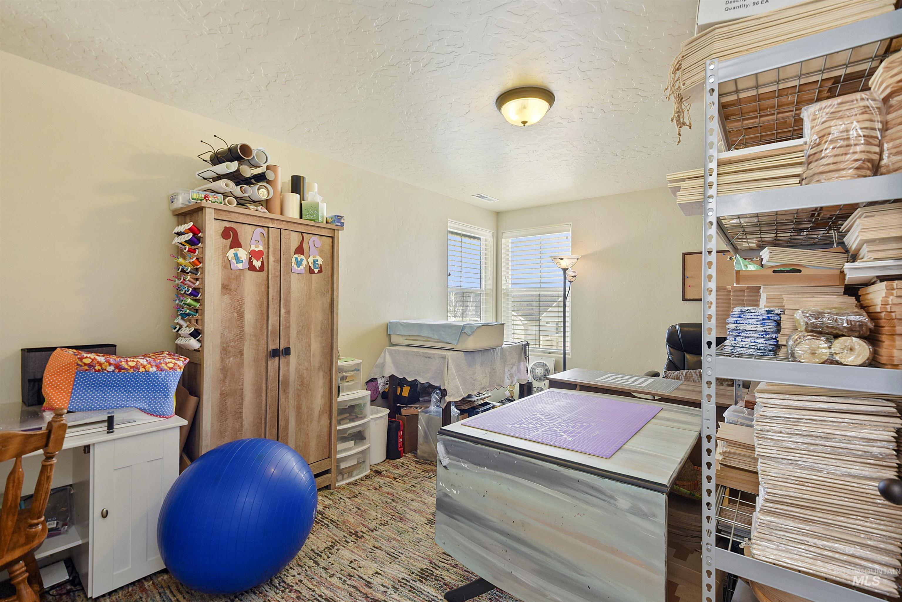6091 East Path Drive Nampa, ID 83687 - Photo 26 of 33 Office with a textured ceiling