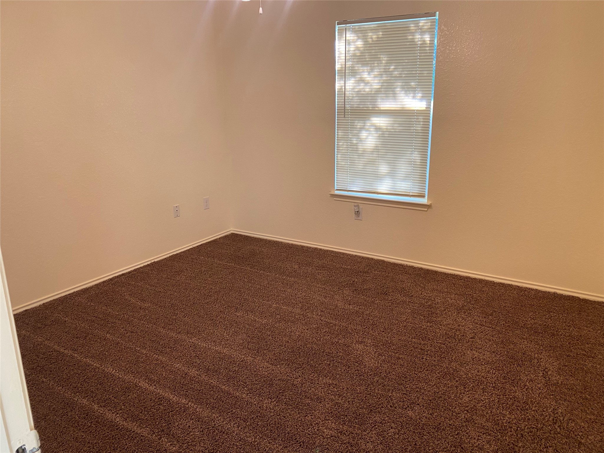 13023 Pleasant Valley Drive Rosharon, TX 77583 - Photo 15 of 21 an empty room with a window