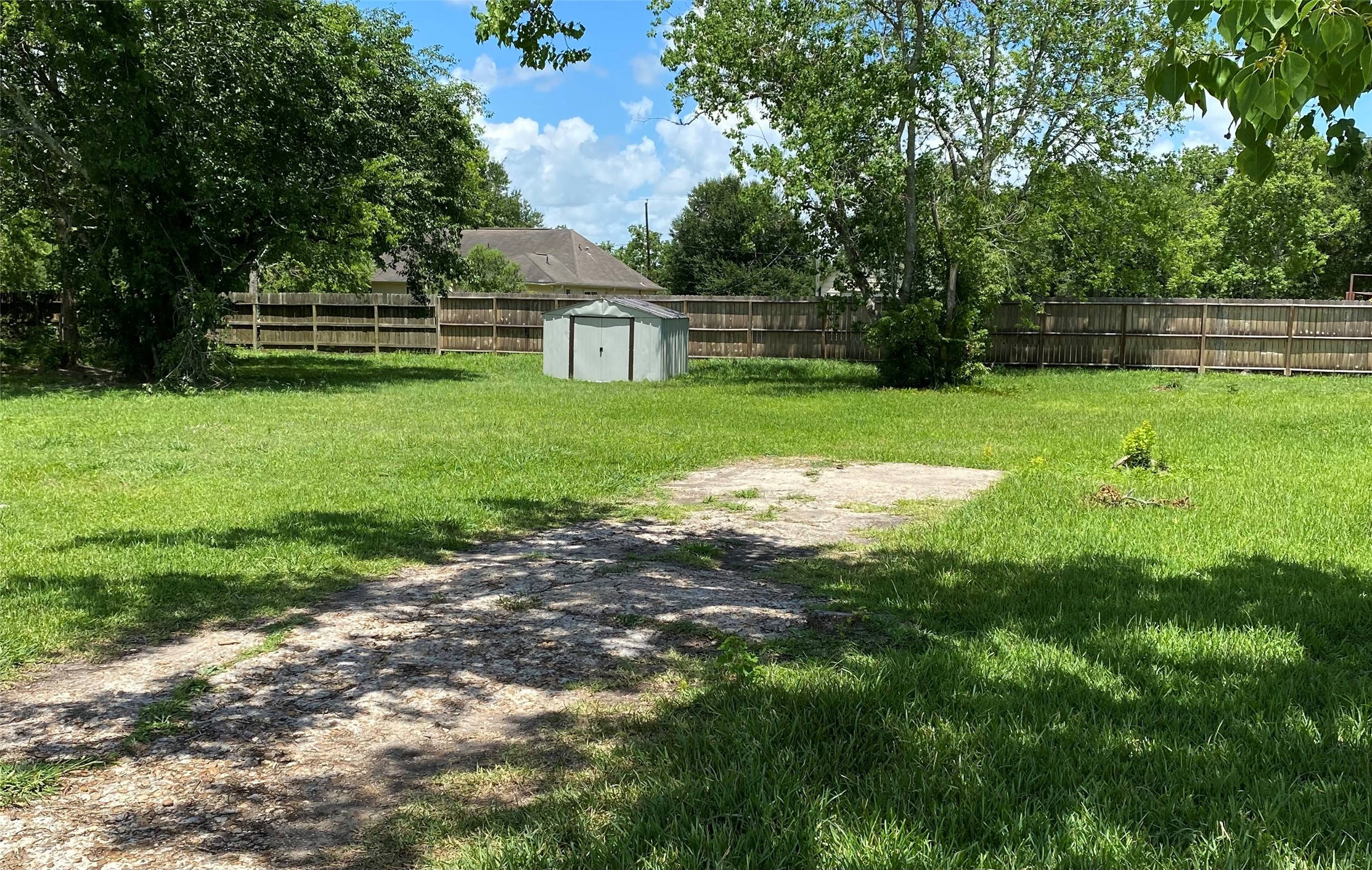13023 Pleasant Valley Drive Rosharon, TX 77583 - Photo 19 of 21 a view of a house with a yard