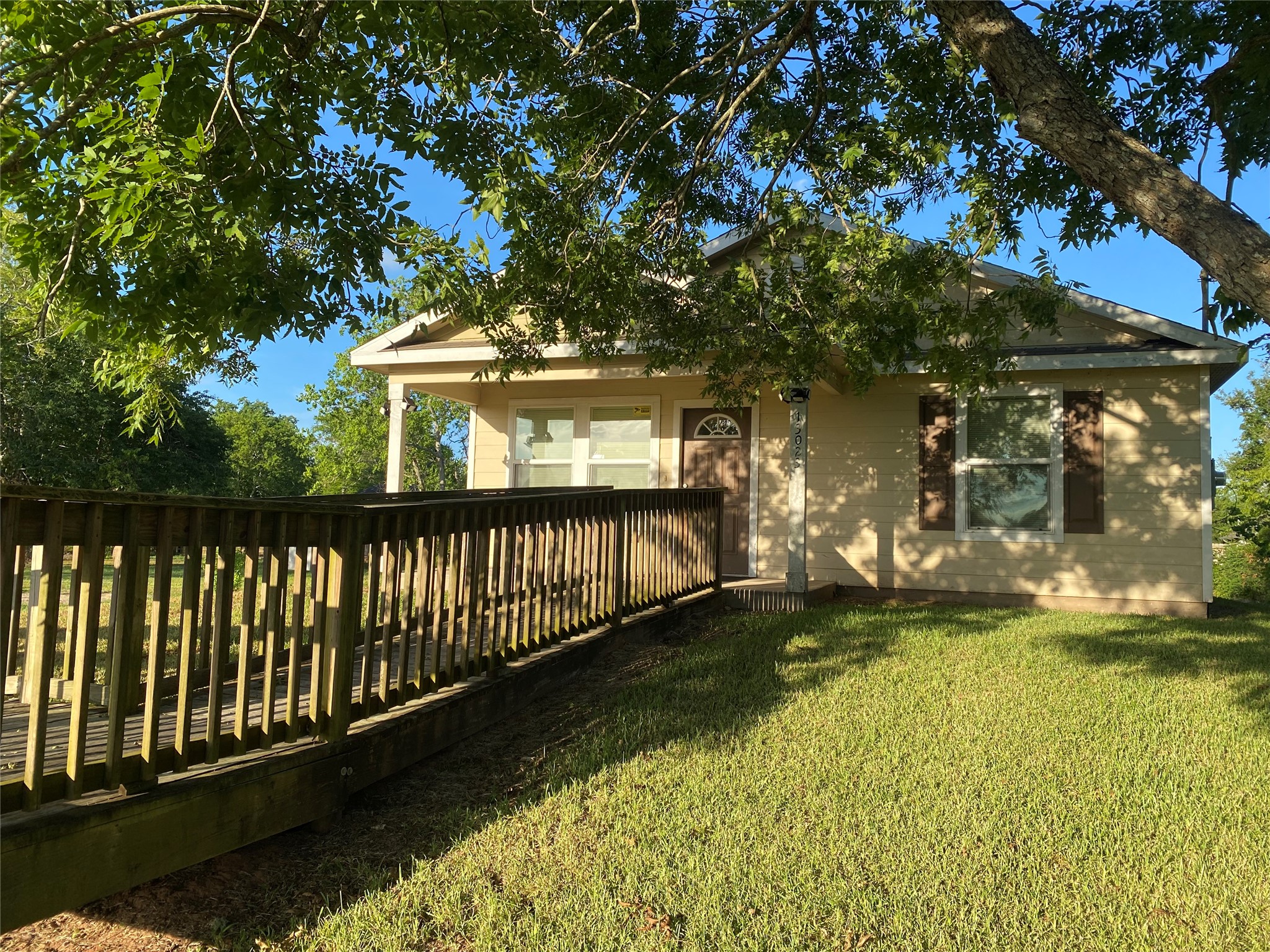 13023 Pleasant Valley Drive Rosharon, TX 77583 - Photo 4 of 21 a view of a house with a yard
