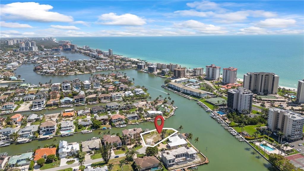 140 Flamingo Avenue Naples, FL 34108 - Photo 14 of 25 a view of a city and lake