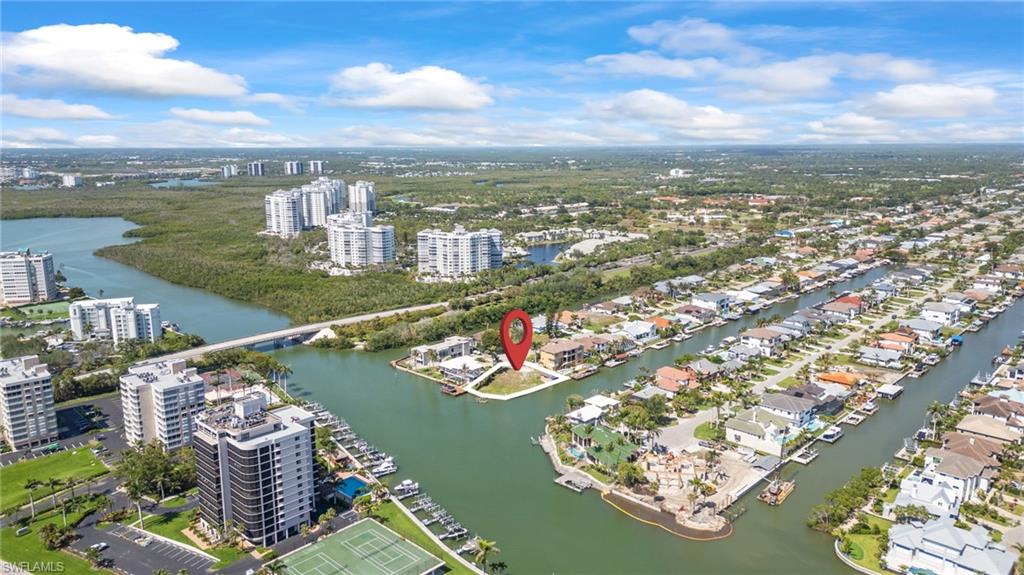 140 Flamingo Avenue Naples, FL 34108 - Photo 20 of 25 an aerial view of residential houses with outdoor space