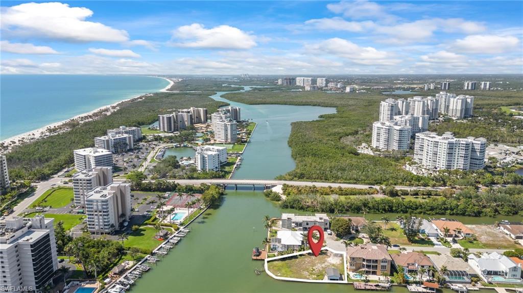 140 Flamingo Avenue Naples, FL 34108 - Photo 21 of 25 a view of a city and lake