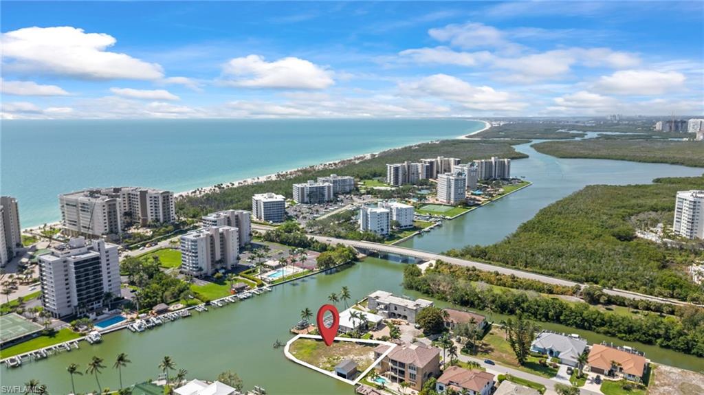 140 Flamingo Avenue Naples, FL 34108 - Photo 8 of 25 a view of a city and lake