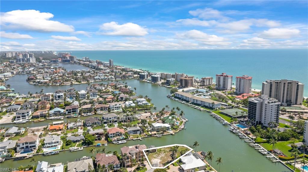 140 Flamingo Avenue Naples, FL 34108 - Photo 4 of 31 a view of a city and lake