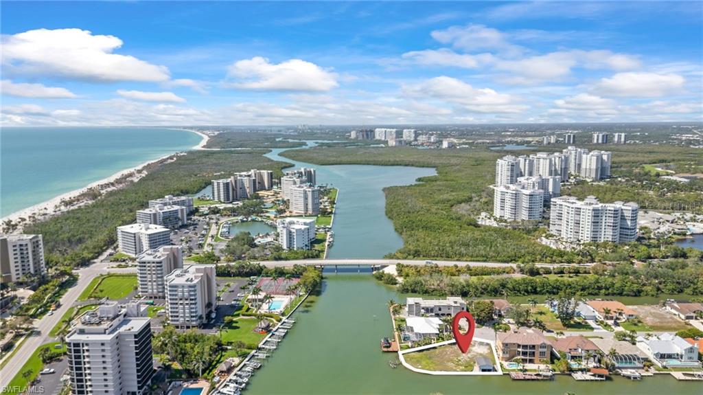 140 Flamingo Avenue Naples, FL 34108 - Photo 9 of 25 a view of a city with an ocean view