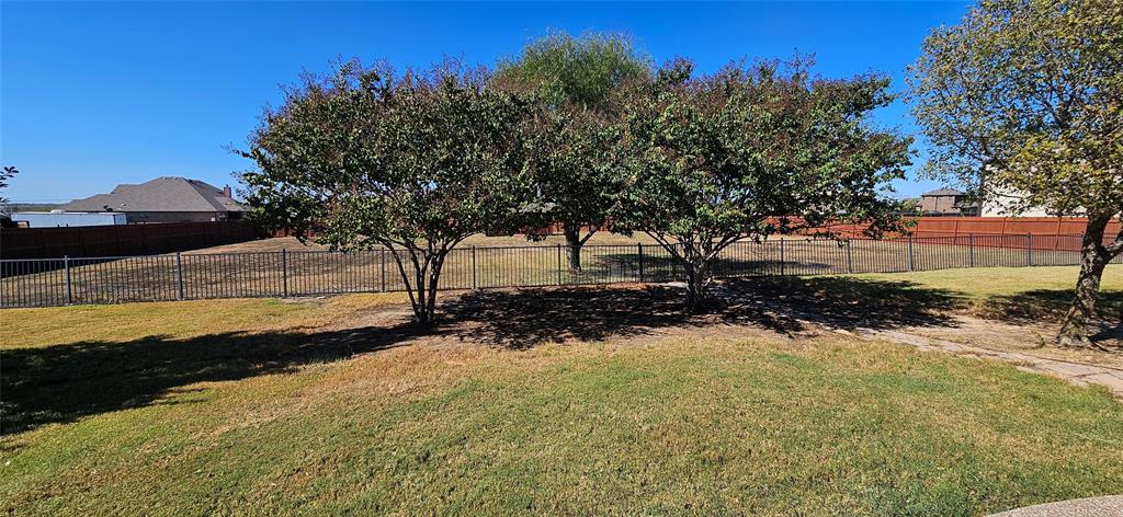 7641 Drew Lane Midlothian, TX 76065 - Photo 13 of 13 a view of a yard with an outdoor space