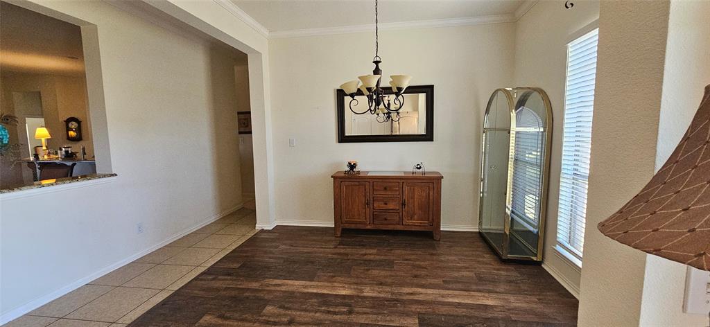 7641 Drew Lane Midlothian, TX 76065 - Photo 3 of 13 a view of a bedroom from a hallway
