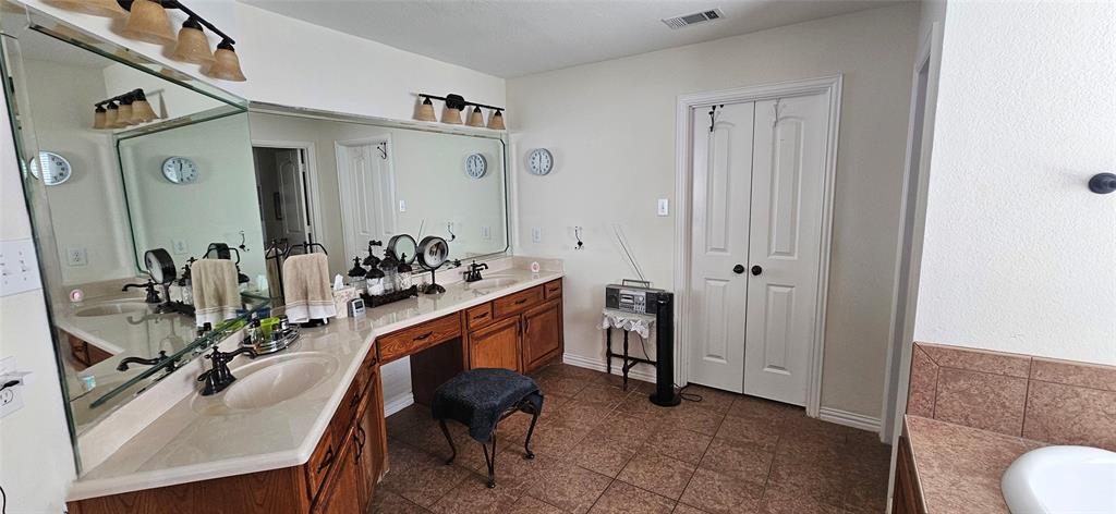 7641 Drew Lane Midlothian, TX 76065 - Photo 7 of 13 a very nice looking room with a chair