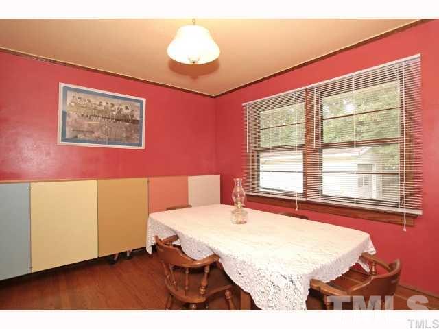 3114 Dixon Road Durham, NC 27707 - Photo 6 of 11 Roomy dining room with hardwood floors.