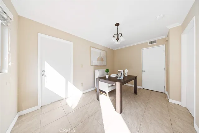 a view of a livingroom with furniture and a window