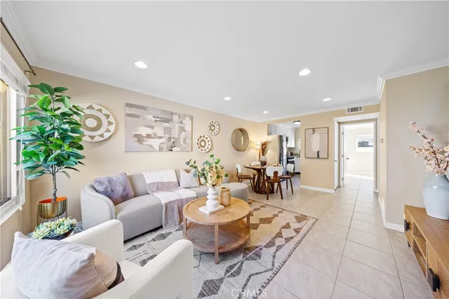 a living room with furniture and a table