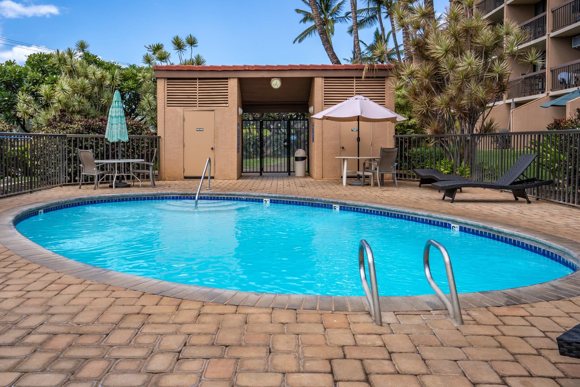 2191 South Kihei Road, Unit 1110 Kihei, HI 96753 - Photo 18 of 20 an outdoor space with pool and furniture