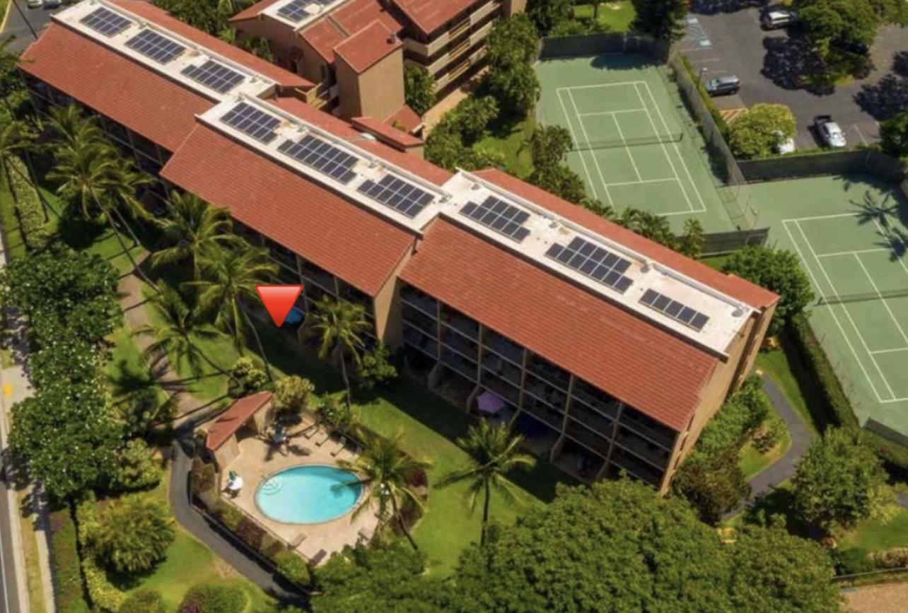 2191 South Kihei Road, Unit 1110 Kihei, HI 96753 - Photo 20 of 20 an aerial view of a house with a yard and potted plants