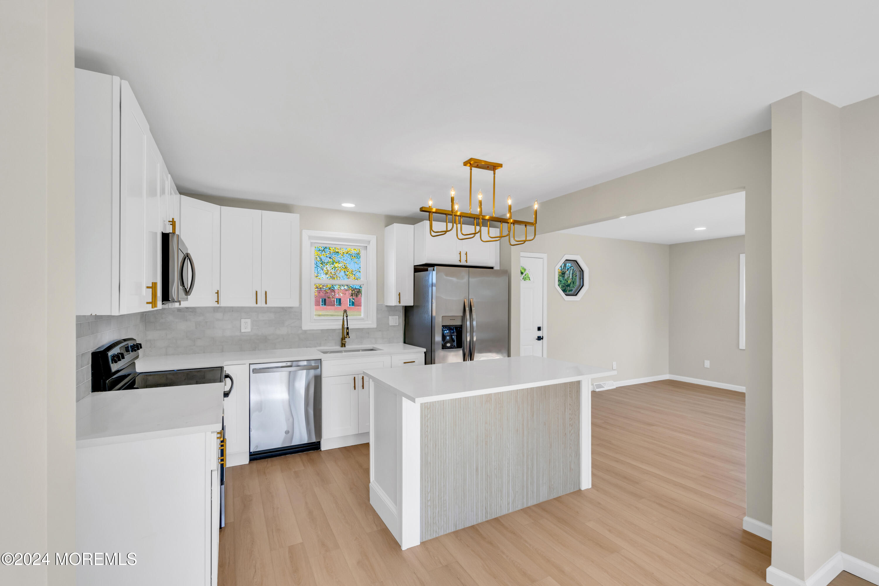 2053 Bustleton Road Burlington, NJ 08016 - Photo 13 of 55 a kitchen with a sink stove top oven and cabinets