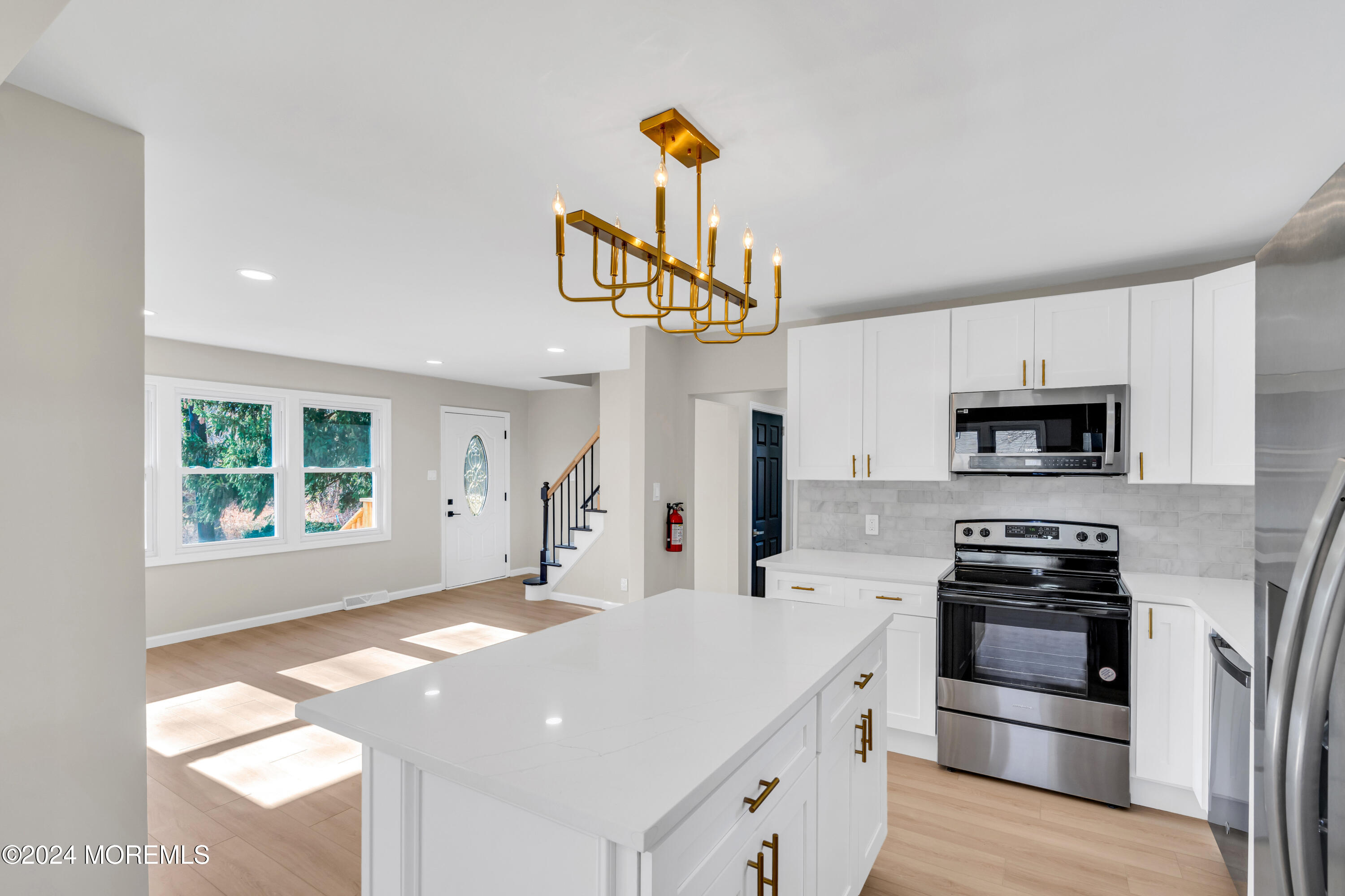 2053 Bustleton Road Burlington, NJ 08016 - Photo 21 of 55 a kitchen with granite countertop a stove and a sink
