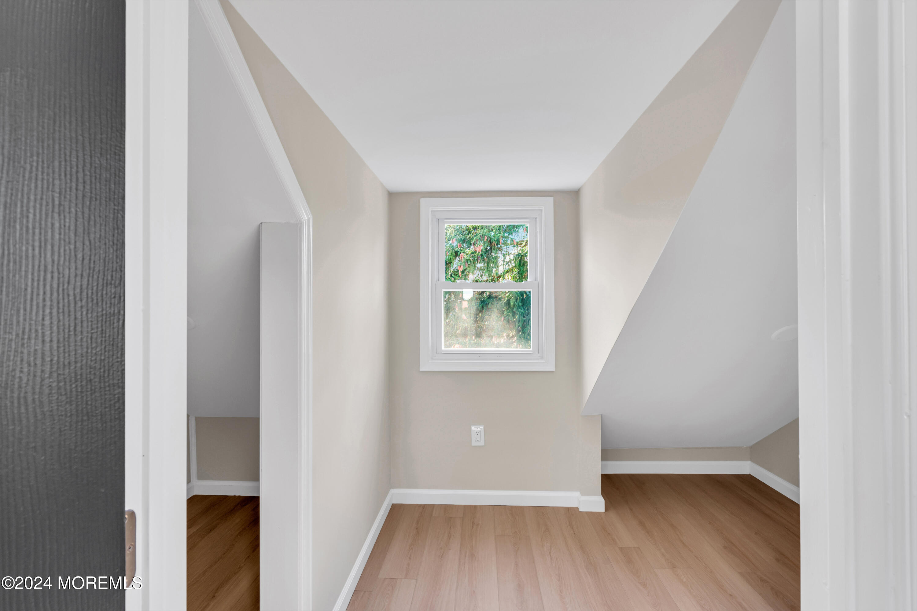 2053 Bustleton Road Burlington, NJ 08016 - Photo 44 of 55 a view of an empty room with wooden floor and a window