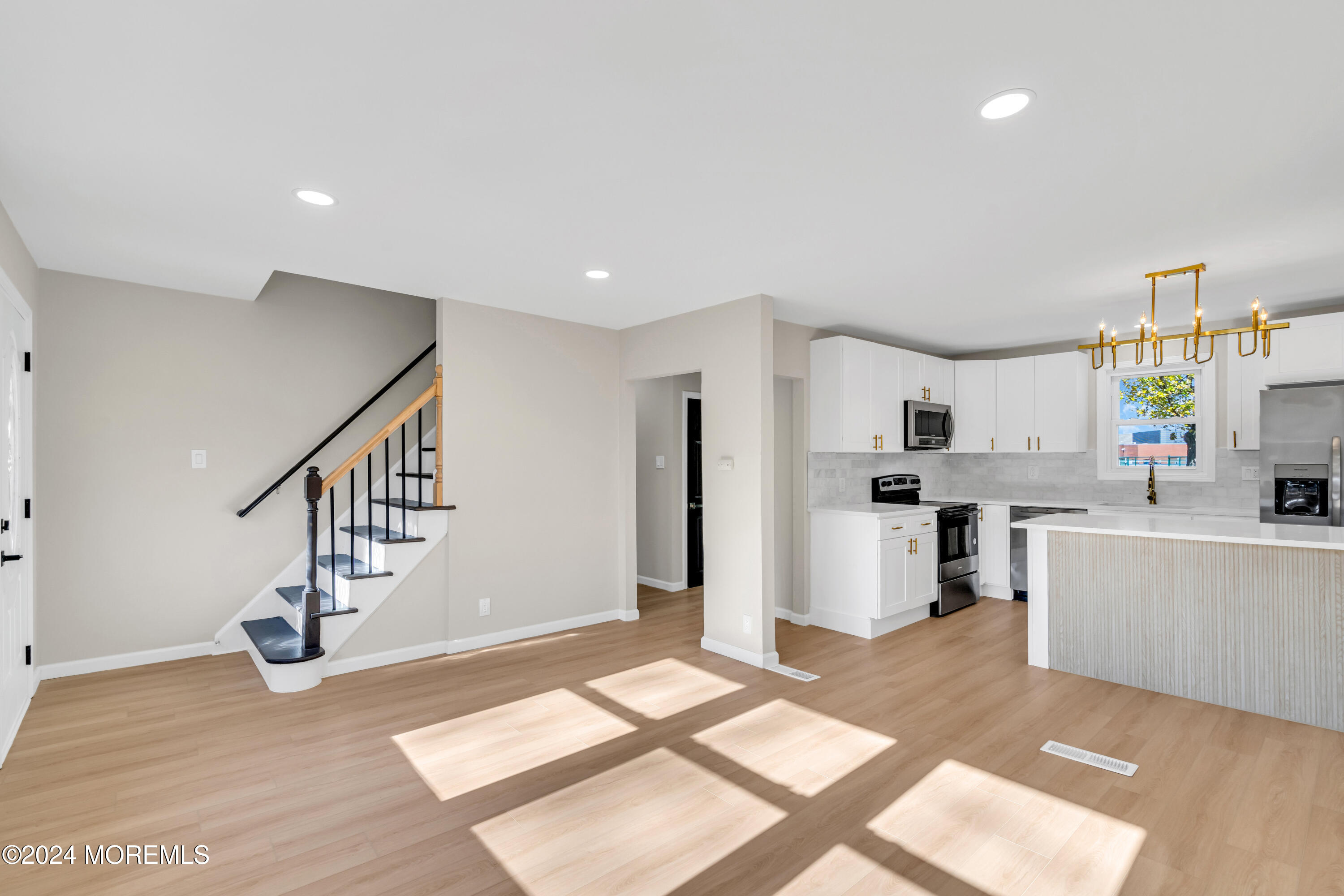 2053 Bustleton Road Burlington, NJ 08016 - Photo 10 of 55 a view of a kitchen with furniture and staircase