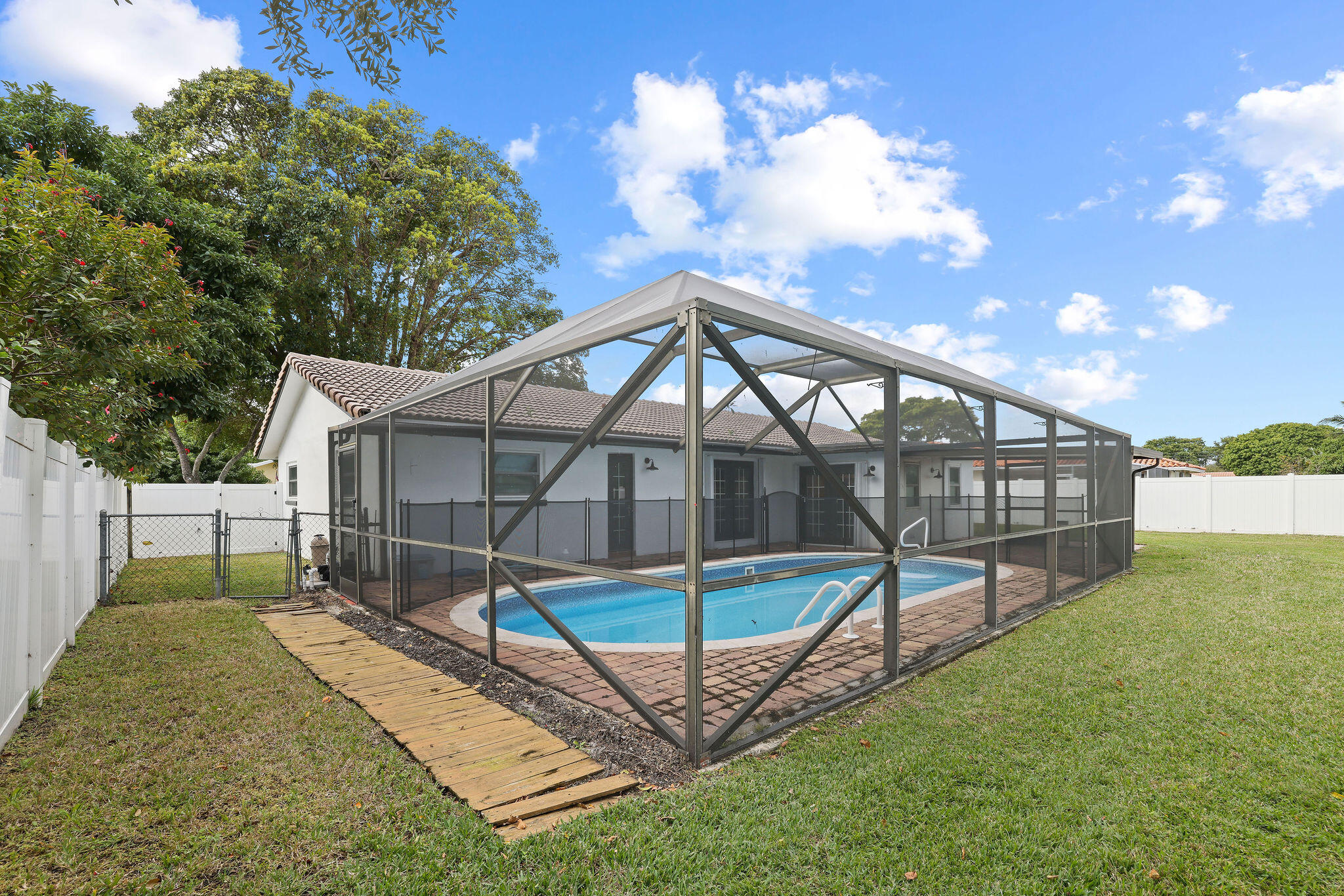3376 Northwest 26th Court Boca Raton, FL 33434 - Photo 3 of 30 11_3376_nw_26_ct_boca_photo_by_supremesc