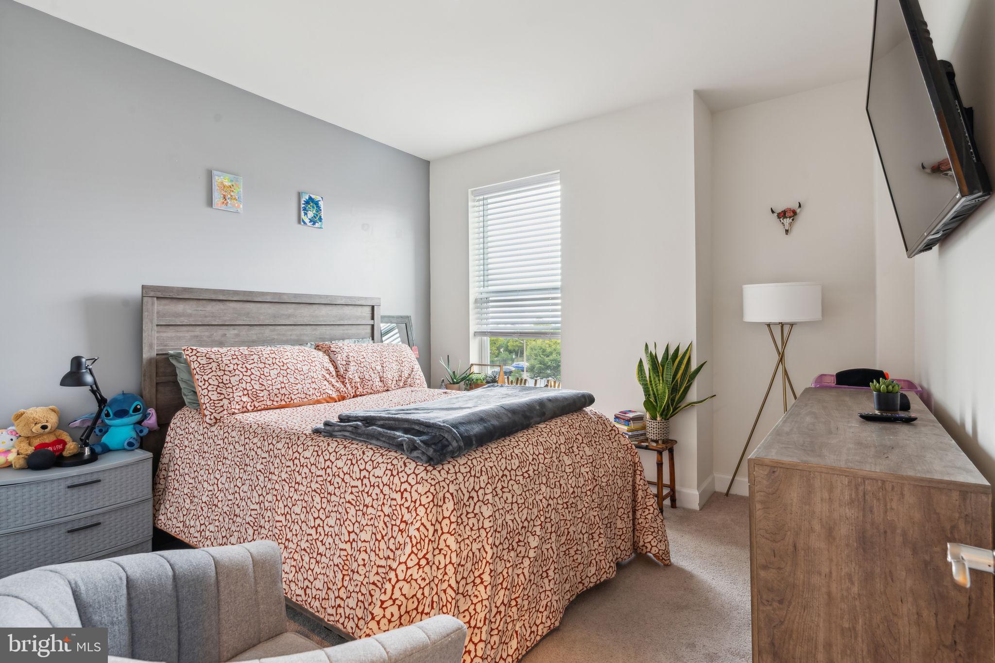7635 Stemhart Lane Hanover, MD 21076 - Photo 24 of 28 a bedroom with furniture and a window
