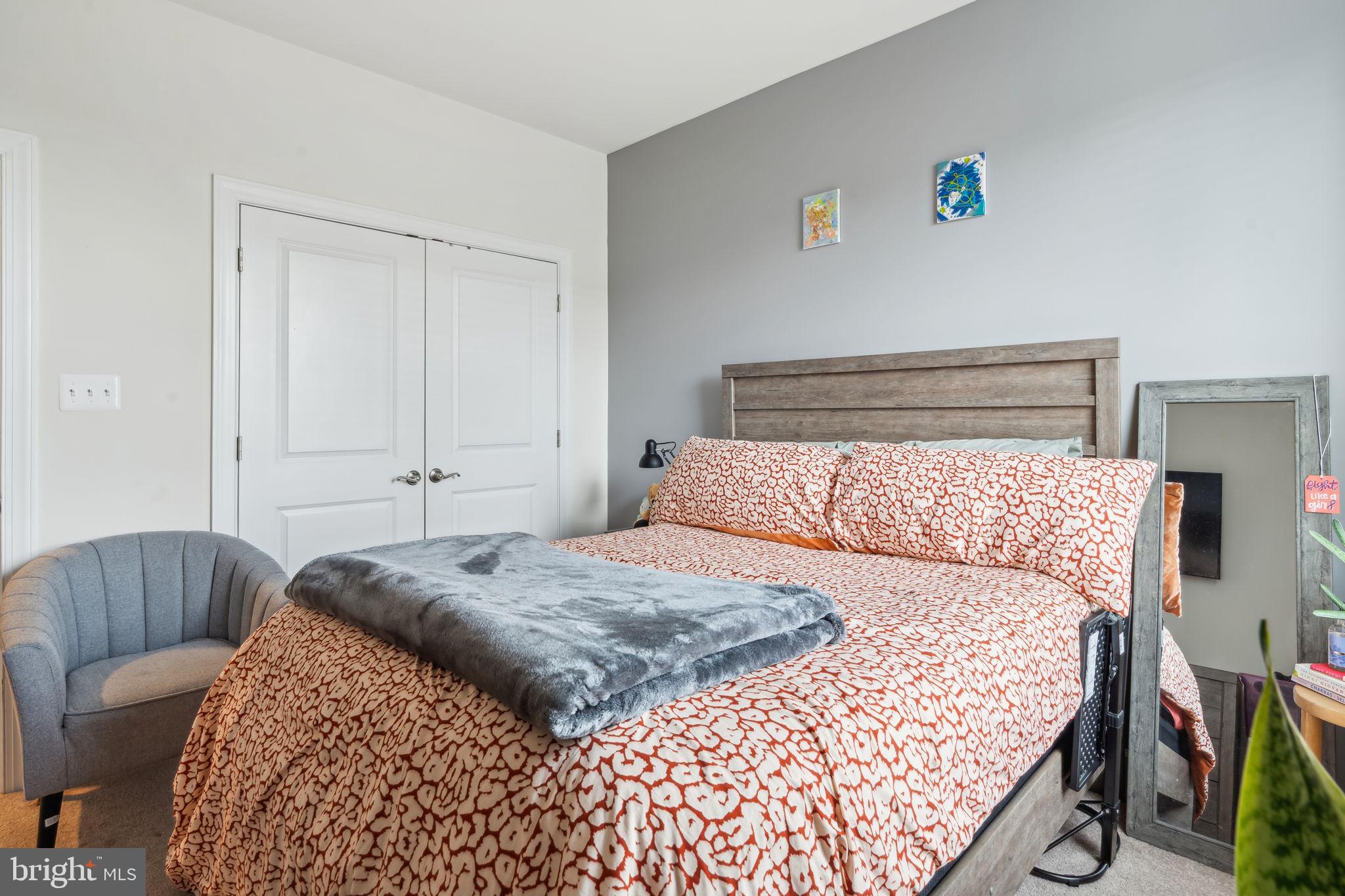 7635 Stemhart Lane Hanover, MD 21076 - Photo 25 of 28 a bedroom with a bed and a dresser